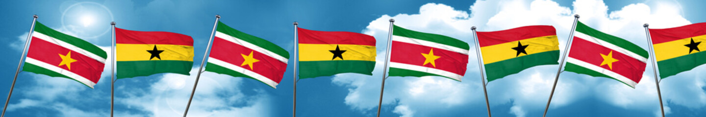 Suriname flag with Ghana flag, 3D rendering