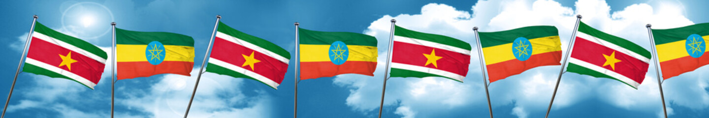 Suriname flag with Ethiopia flag, 3D rendering