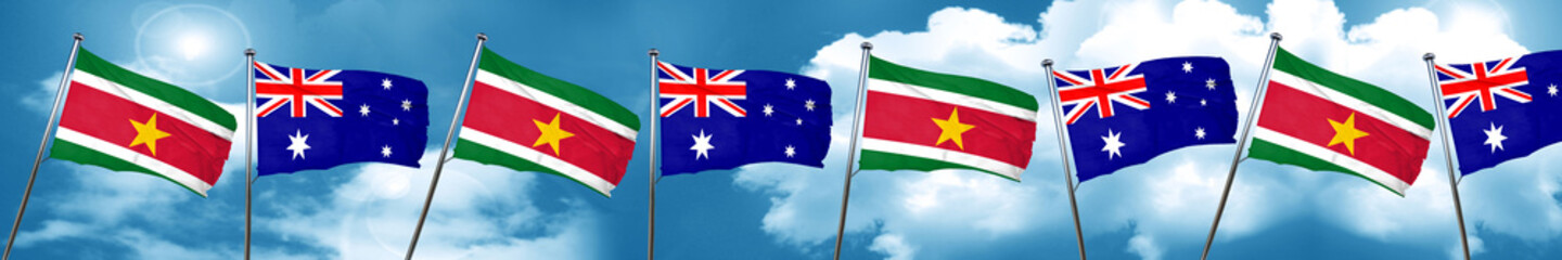 Suriname flag with Australia flag, 3D rendering