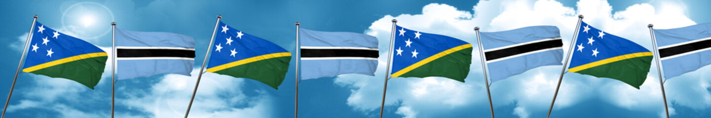 Solomon islands flag with Botswana flag, 3D rendering