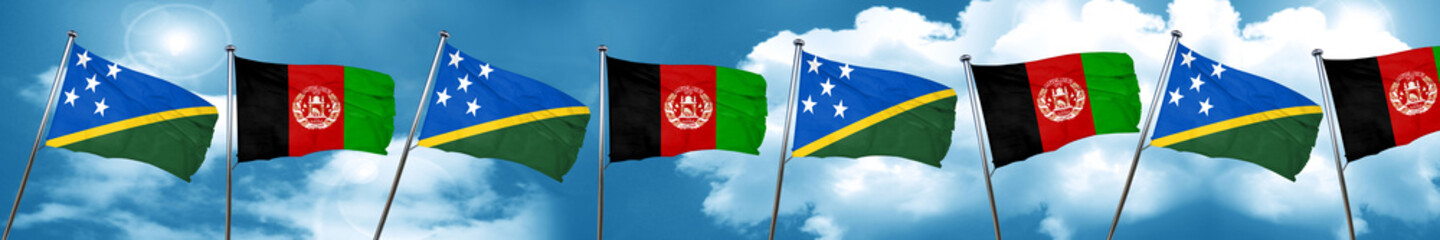 Solomon islands flag with afghanistan flag, 3D rendering
