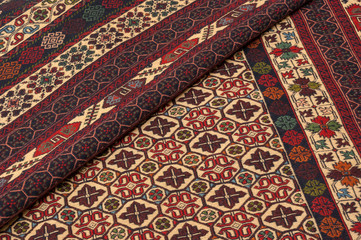 Close up of a hand woven persian Sirjan kilim rug