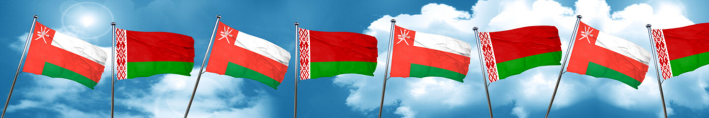 Oman flag with Belarus flag, 3D rendering