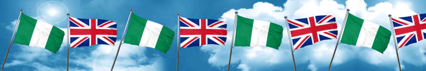 Naklejka na ściany i meble Nigeria flag with Great Britain flag, 3D rendering