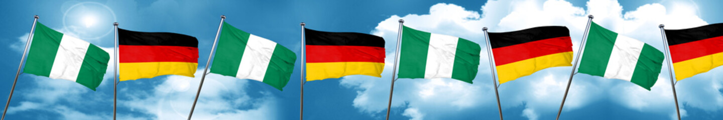 Nigeria flag with Germany flag, 3D rendering
