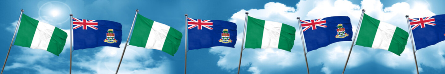 Nigeria flag with Cayman islands flag, 3D rendering