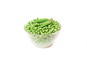Green peas and pea pod on white