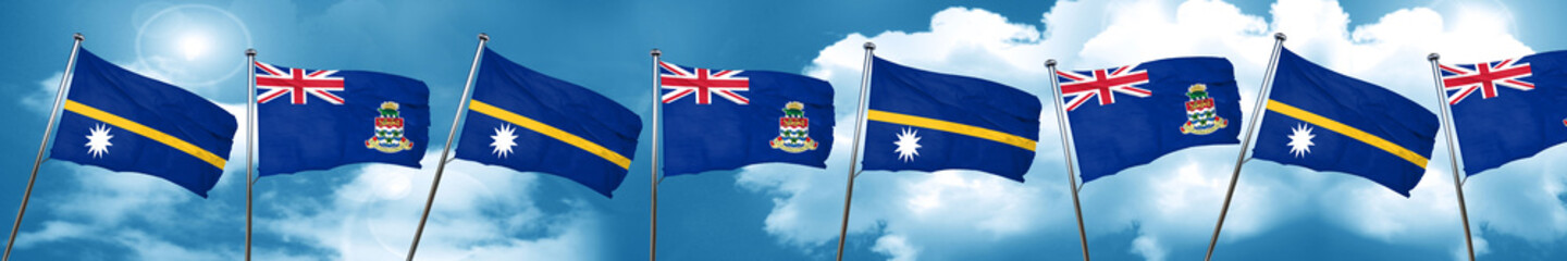 Nauru flag with Cayman islands flag, 3D rendering