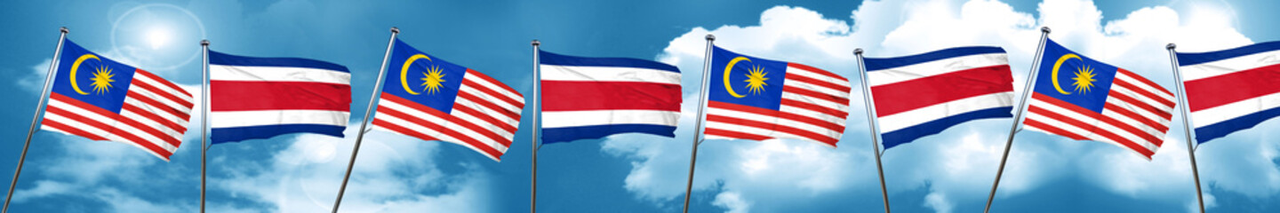 Malaysia flag with Costa Rica flag, 3D rendering