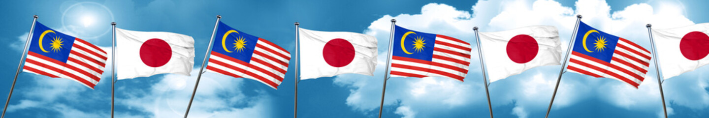 Malaysia flag with Japan flag, 3D rendering