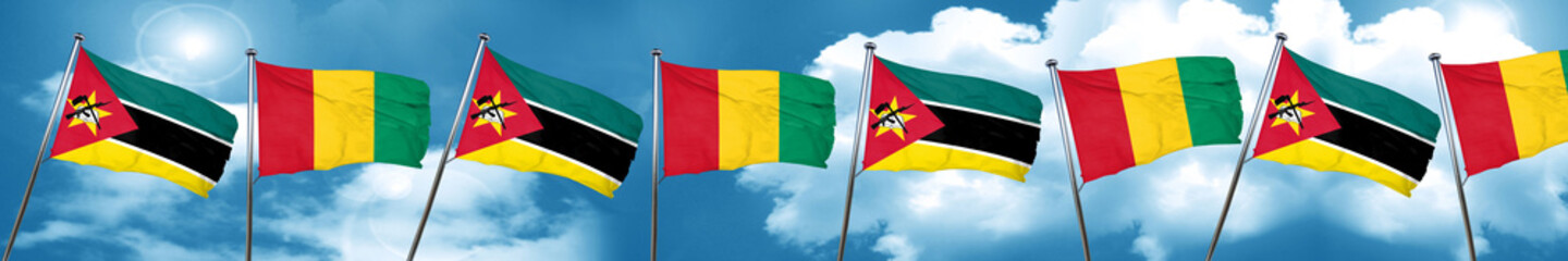 Fototapeta na wymiar Mozambique flag with Guinea flag, 3D rendering