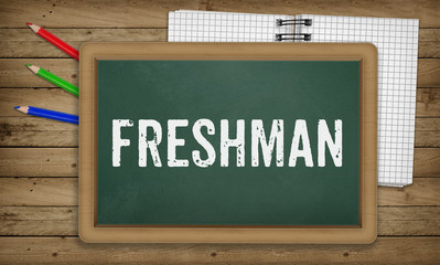 Freshman on blackboard, Education school concept