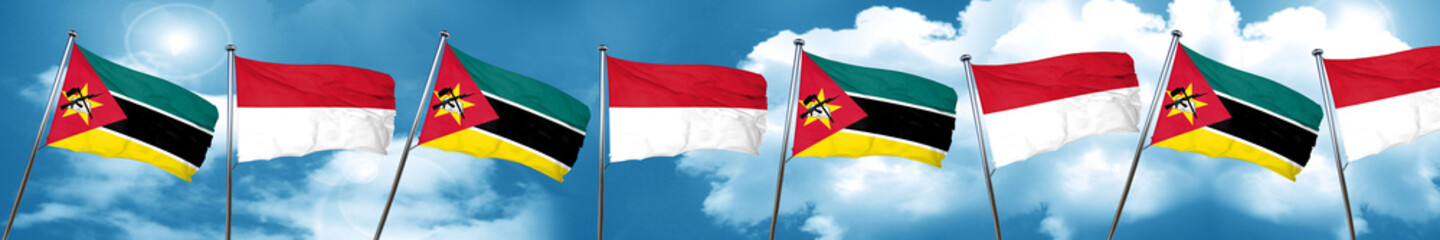 Mozambique flag with Indonesia flag, 3D rendering