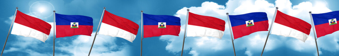 Fototapeta na wymiar monaco flag with Haiti flag, 3D rendering