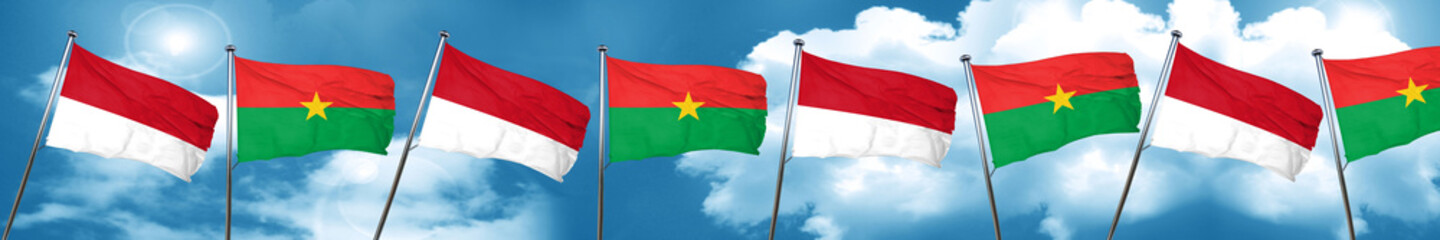 Fototapeta na wymiar monaco flag with Burkina Faso flag, 3D rendering