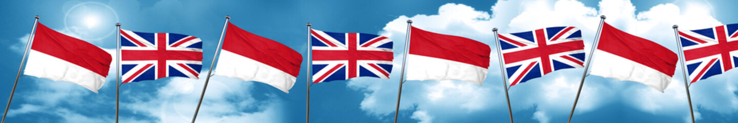 Fototapeta na wymiar monaco flag with Great Britain flag, 3D rendering