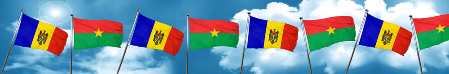 Moldova flag with Burkina Faso flag, 3D rendering