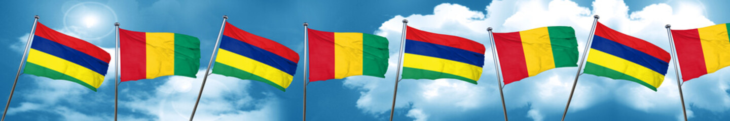 Mauritius flag with Guinea flag, 3D rendering