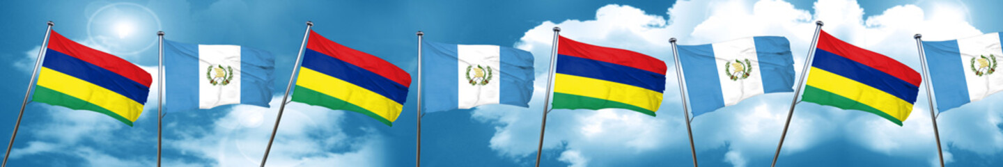Mauritius flag with Guatemala flag, 3D rendering