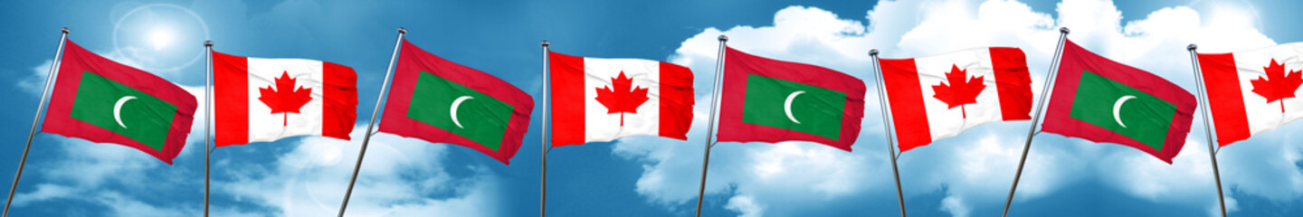 Maldives flag with Canada flag, 3D rendering