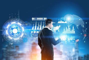 Man working with data in a city