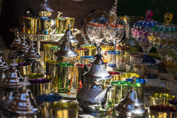 Arabic teapot, various glass vessels with many colors, typical s