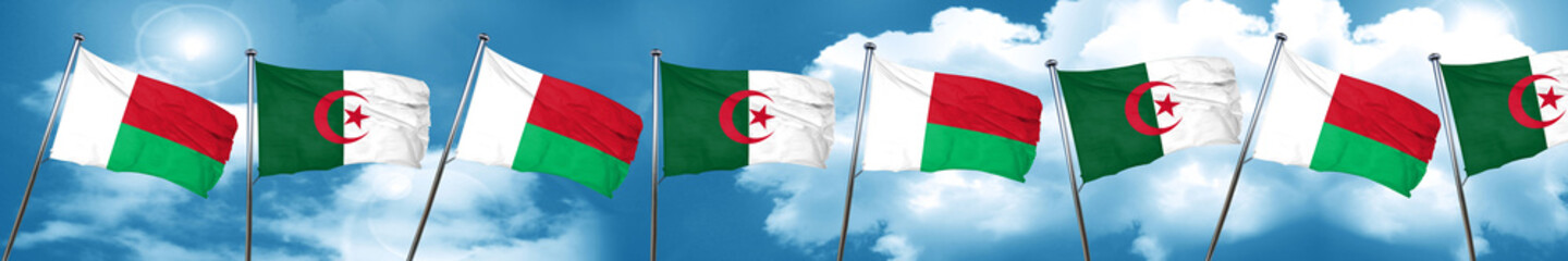 Madagascar flag with Algeria flag, 3D rendering