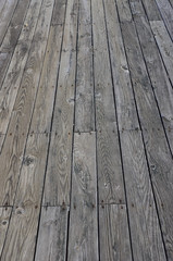 Natural aged wooden deck background.