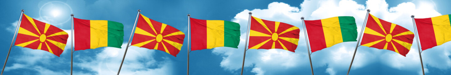 Macedonia flag with Guinea flag, 3D rendering