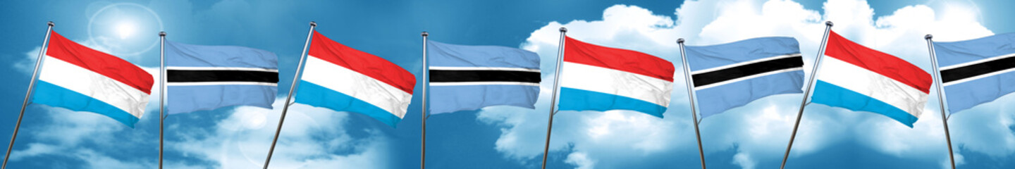 Naklejka na ściany i meble Luxembourg flag with Botswana flag, 3D rendering