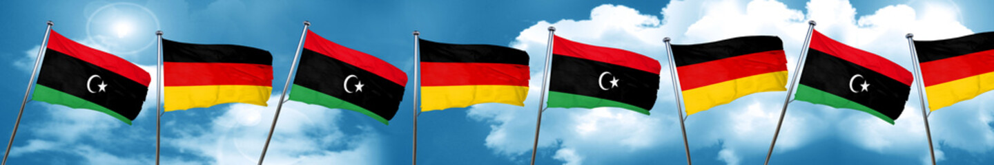 Libya flag with Germany flag, 3D rendering