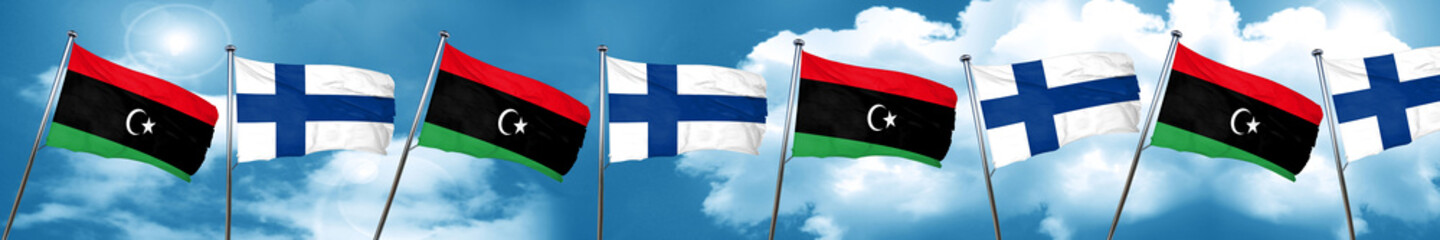 Fototapeta na wymiar Libya flag with Finland flag, 3D rendering