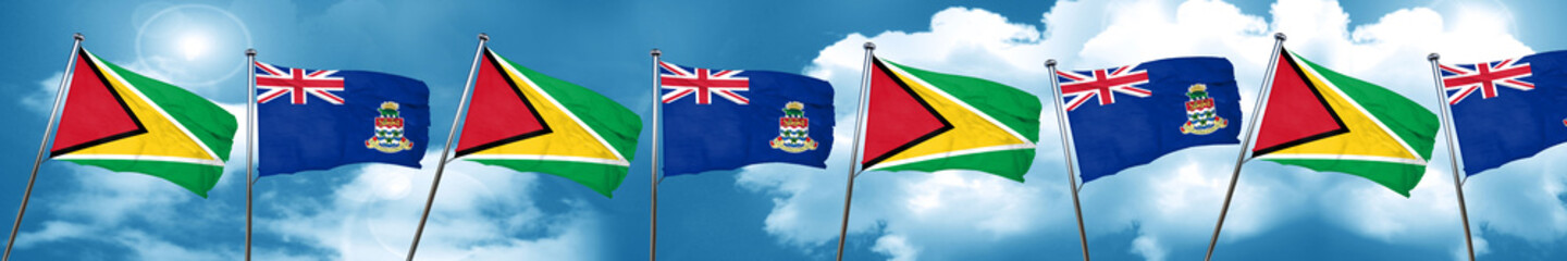 Guyana flag with Cayman islands flag, 3D rendering