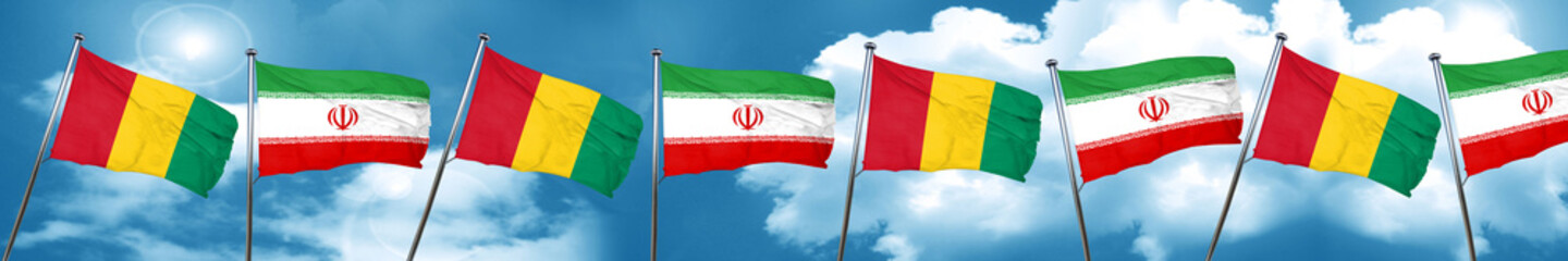 Guinea flag with Iran flag, 3D rendering