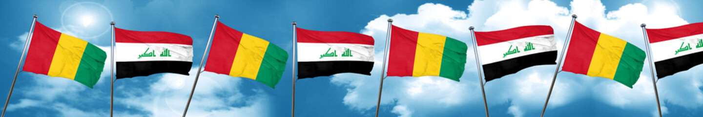 Guinea flag with Iraq flag, 3D rendering
