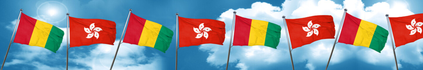 Guinea flag with Hong Kong flag, 3D rendering