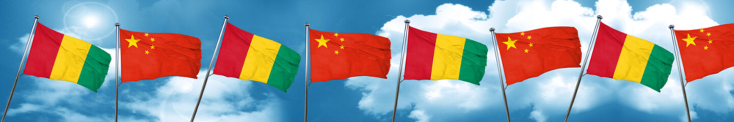 Guinea flag with China flag, 3D rendering