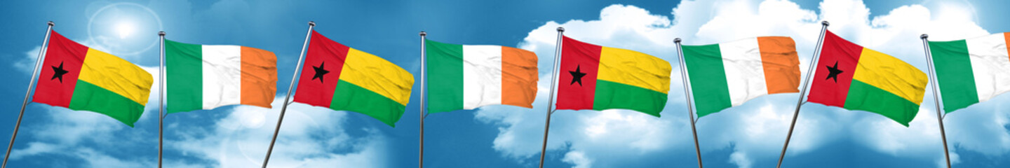 Guinea bissau flag with Ireland flag, 3D rendering