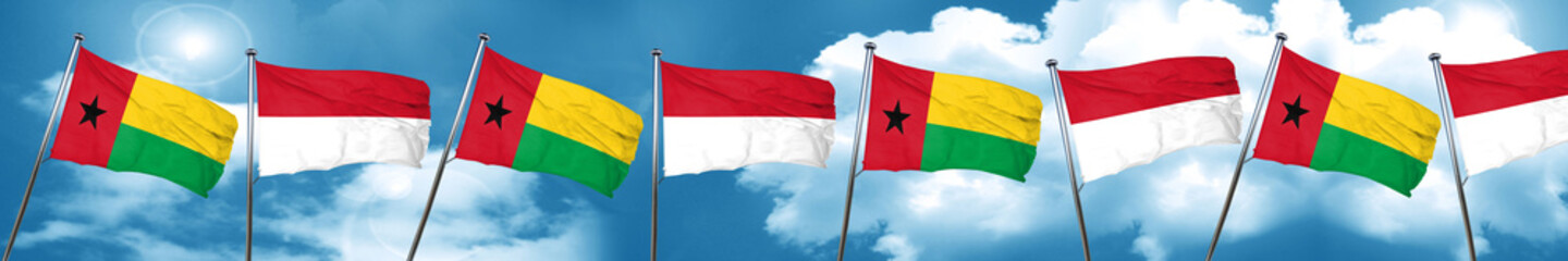 Fototapeta na wymiar Guinea bissau flag with Indonesia flag, 3D rendering