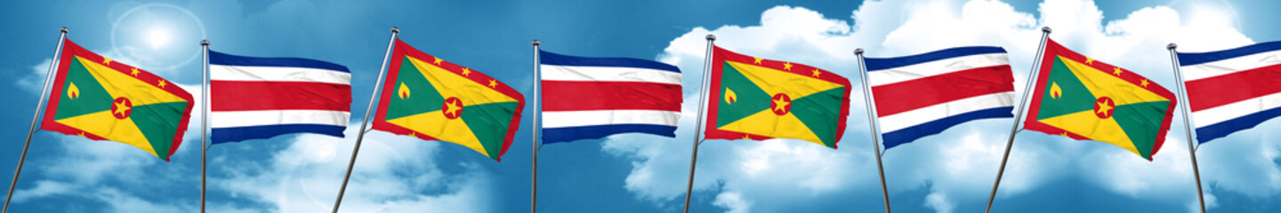 Grenada flag with Costa Rica flag, 3D rendering