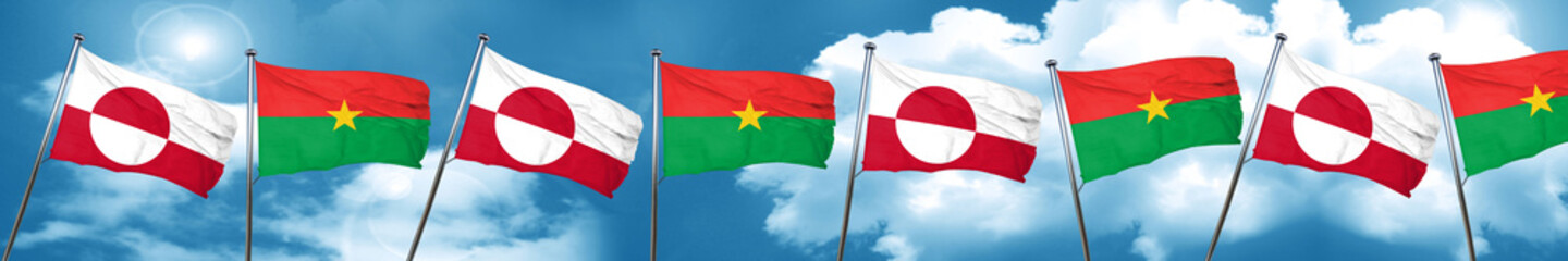greenland flag with Burkina Faso flag, 3D rendering