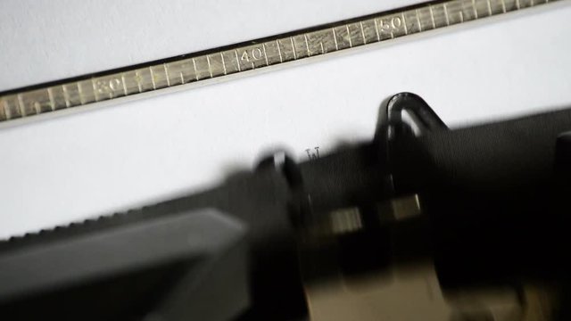 Typing the expression Web 3.0 with an old manual typewriter