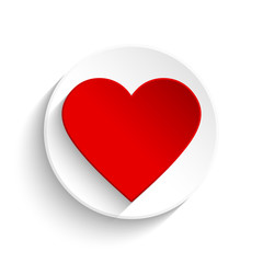 Red heart on white button