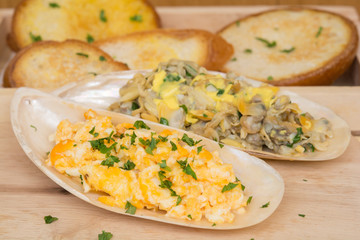 omelets with Butter clams on shell and bread Serving style