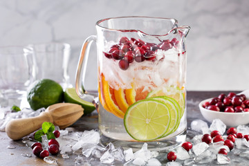 Infused water with citrus fruits and cranberry