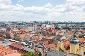 Poznan, Poland - June 28, 2016: View on buildings and collegiate church in polish town Poznan