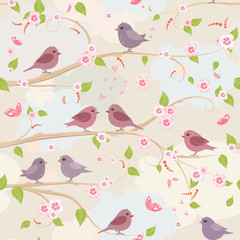 cute seamless texture with pretty birds on branch of sakura