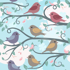 seamless texture with cute birds on branches in spring