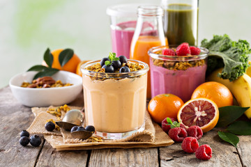 Orange mango smoothie with granola