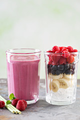 Berry smoothie ingredients in tall glass